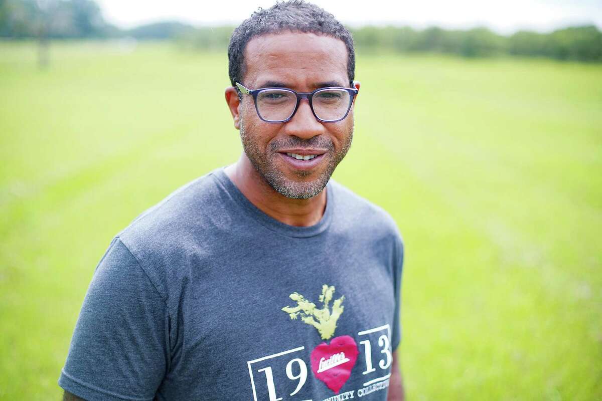 Chef Chris Williams of Lucille’s restaurant in Houston stands in Bates Allen Park, where he will create a 10-acre produce farm for the area in Kendleton on Thursday, Aug. 5, 2021.
