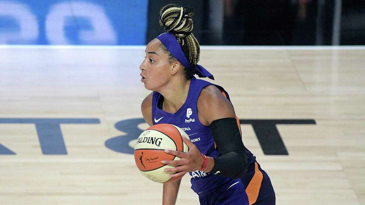 Phoenix Mercury guard Bria Hartley brings the ball up the court against the Los Angeles Sparks in a 2020 game.
