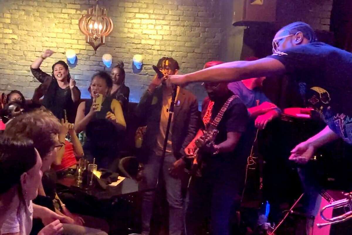 Raphael Saadiq and D’Wayne Wiggins of Tony! Toni! Toné! surprise fans at the Black Cat in San Francisco on Sept. 15. San Francisco Mayor London Breed (top left) was in attendance.