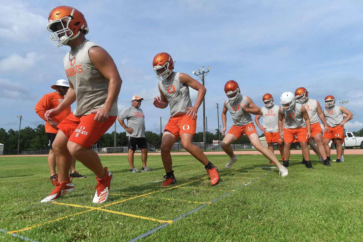 Orangefield gets in evening practice as they prep for the start of the 2021 football season. Photo made Tuesday, August 3, 2021 Kim Brent/The Enterprise