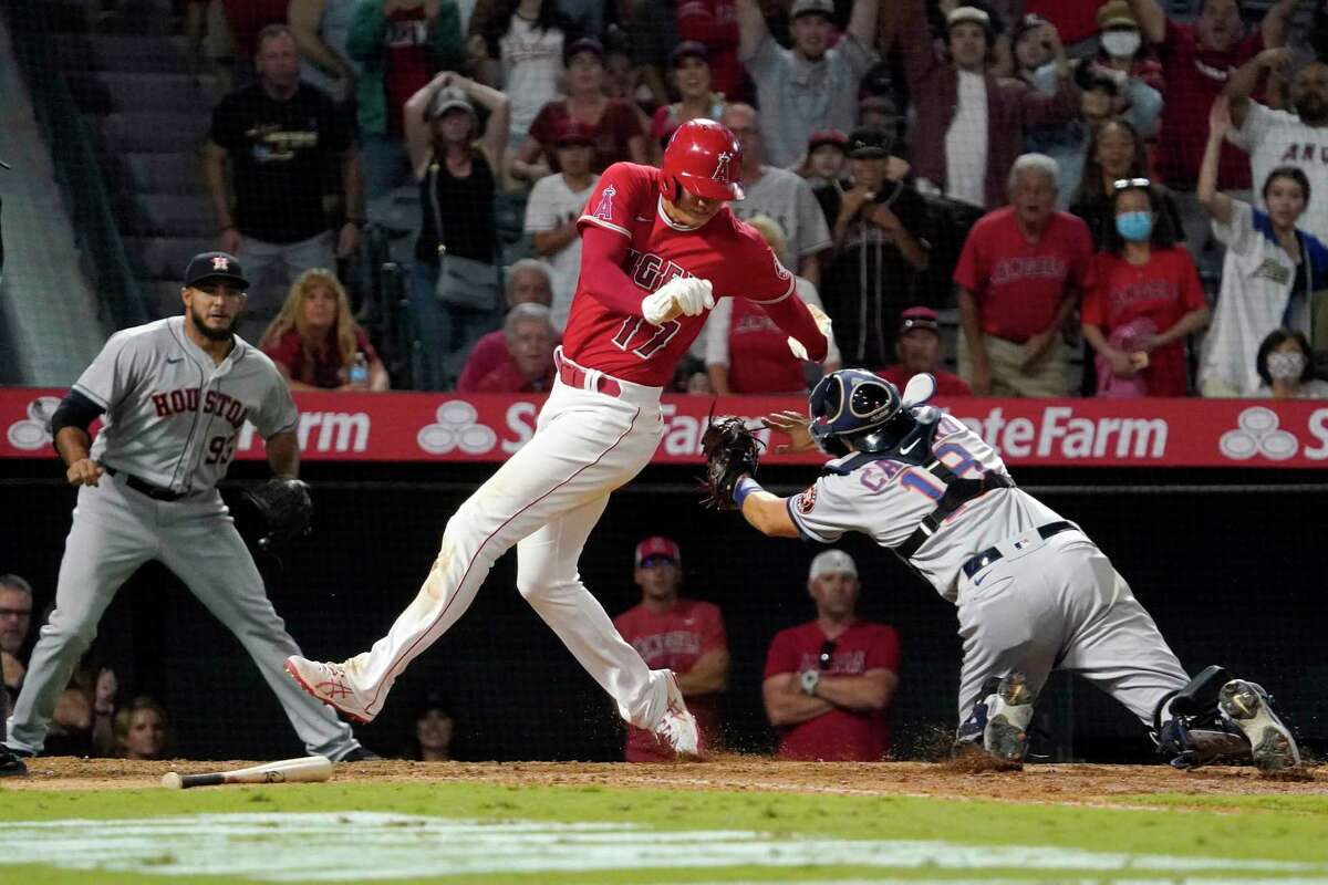 ANAHEIM, CA - SEPTEMBER 20: Houston Astros right fielder Jose Siri (26)  celebrates his lead off home run during the MLB game between the Houston  Astros and the Los Angeles Angels of