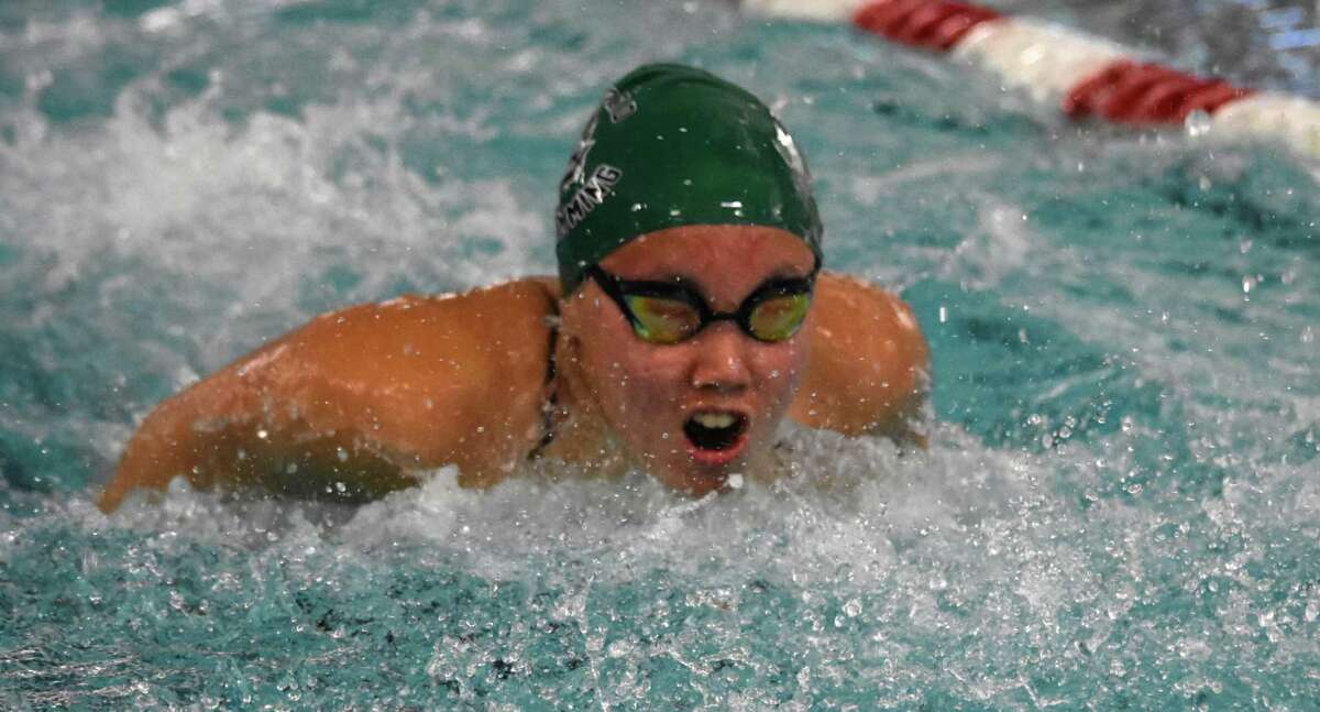 Guilford’s Sorina Cheng swims in the 200-medley relay at the Guilford virtual swim meet at the Branford YMCA in 2020.