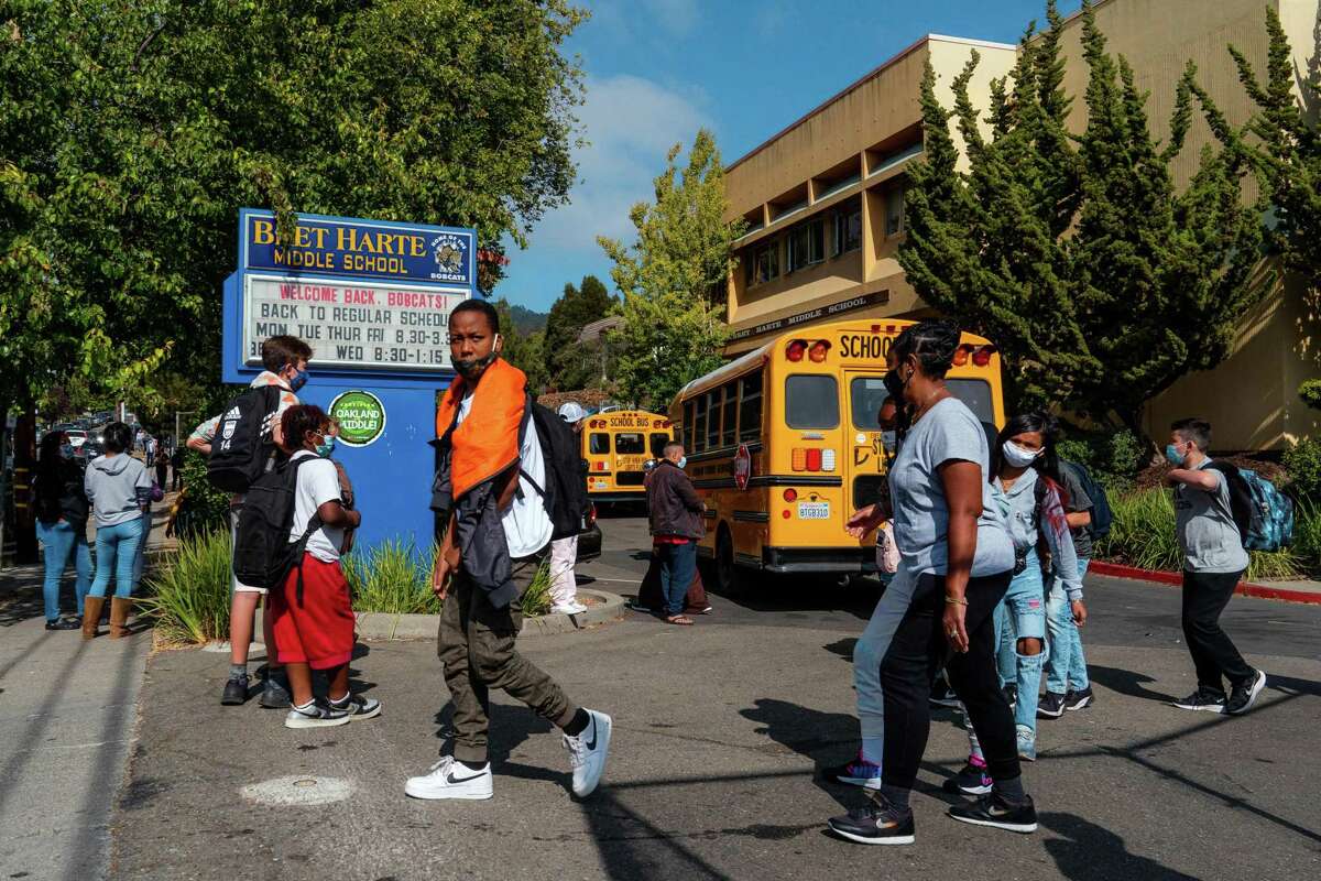 Students leave campus as school lets out at Bret Harte Middle School in Oakland.