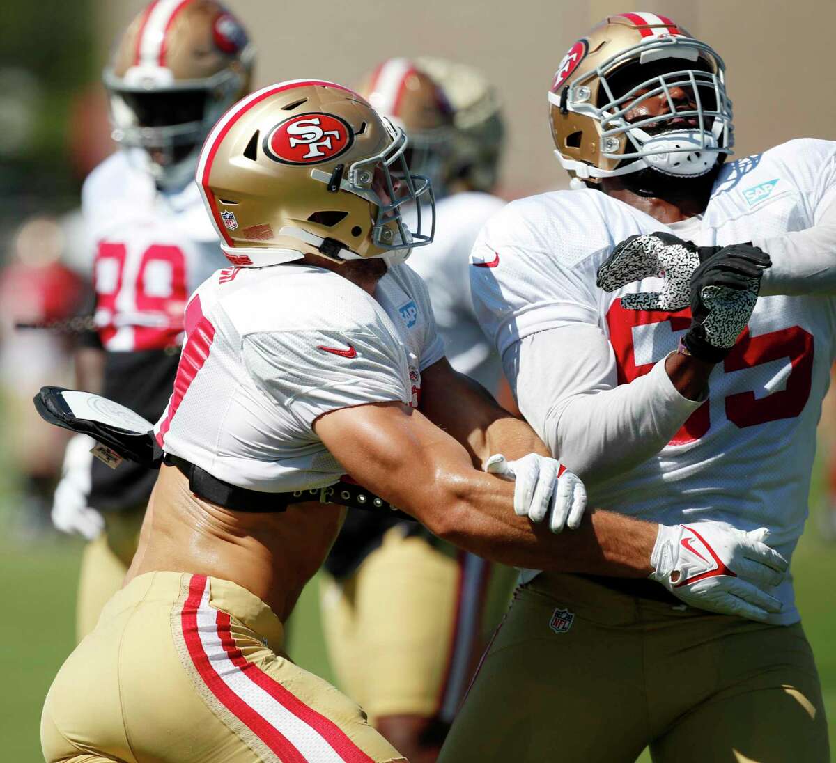 San Francisco 49ers guard Aaron Banks (65) runs on the field during the  first half of