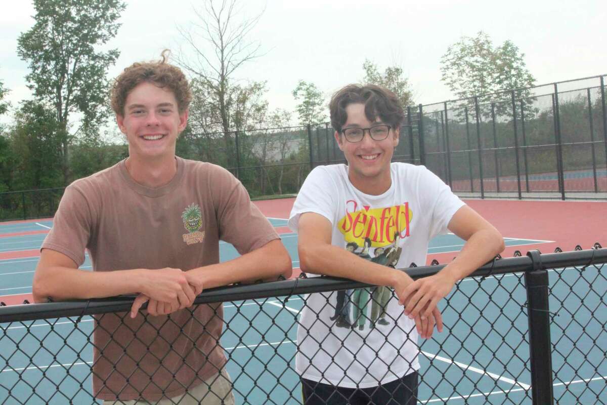 The Big Rapids No. 1 doubles team of Owen Bomay (left) and Jacob McLeod has had a season worth smiling about. (Pioneer photo/John Raffel)