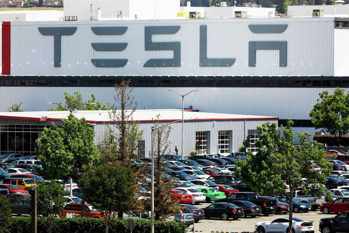 A Tesla employee was arrested in the fatal shooting of a co-worker outside the carmaker’s plant in Fremont. The suspect had argued earlier with the victim.