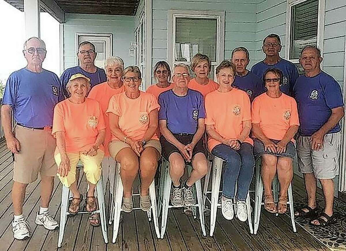 The Cors siblings reunited this month in Gulf Breeze, Florida. They are Joe (back row, from left), Tom, Carolyn, Judy, Marilyn, Ted, Ken and Bill. Their spouses are Ellen (front row, from left), Connie, Ken, Anne and Sandy.