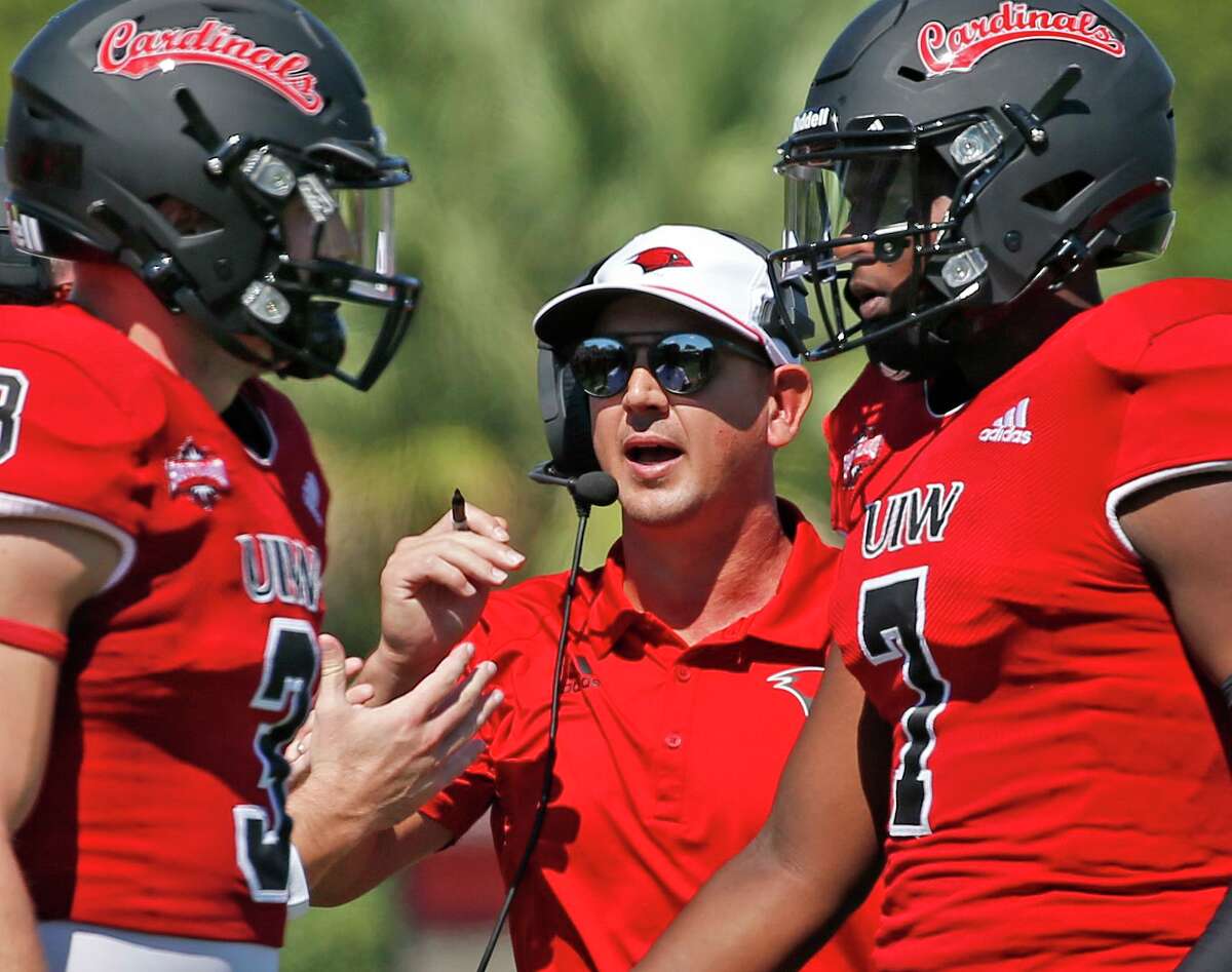 UIW head coach Eric Morris gives instruction on Saturday, Sept. 25, 2021. Halftime score UIW 21 McNeese 0.