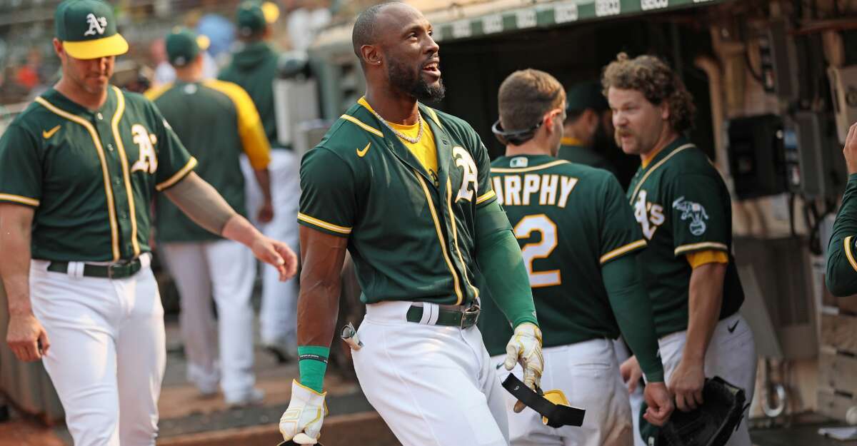 Oakland Athletics Starling Marte (2) in the dugout after his walk off hit in the ninth inning during an MLB game against the Houston Astros at RingCentral Coliseum on Saturday, Sept. 25, 2021, in Oakland, Calif.