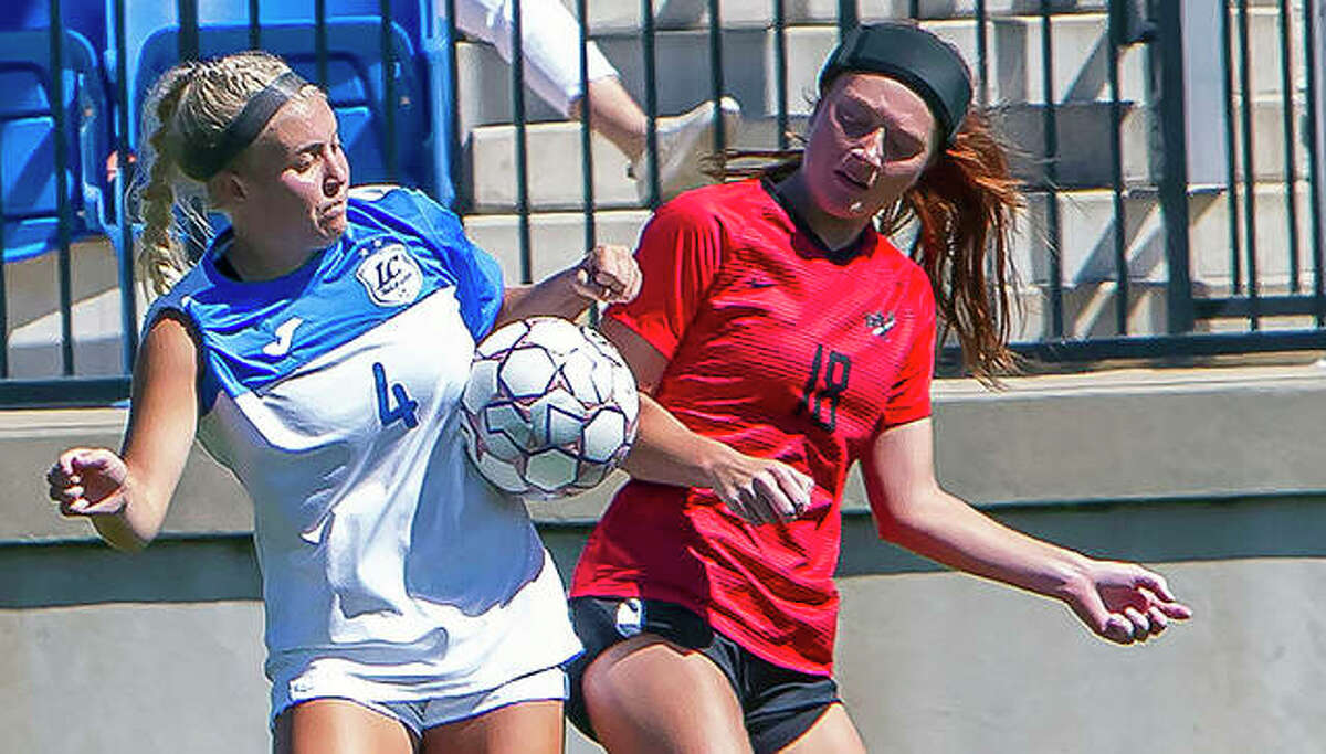 Skylar Hollingshead of Lewis and Clark (4) and Wabash Valley’s Kyra Bivins (18) battle for possession of the ball in Saturday’s 2-0 LCCC win at Tim Rooney Stadium.