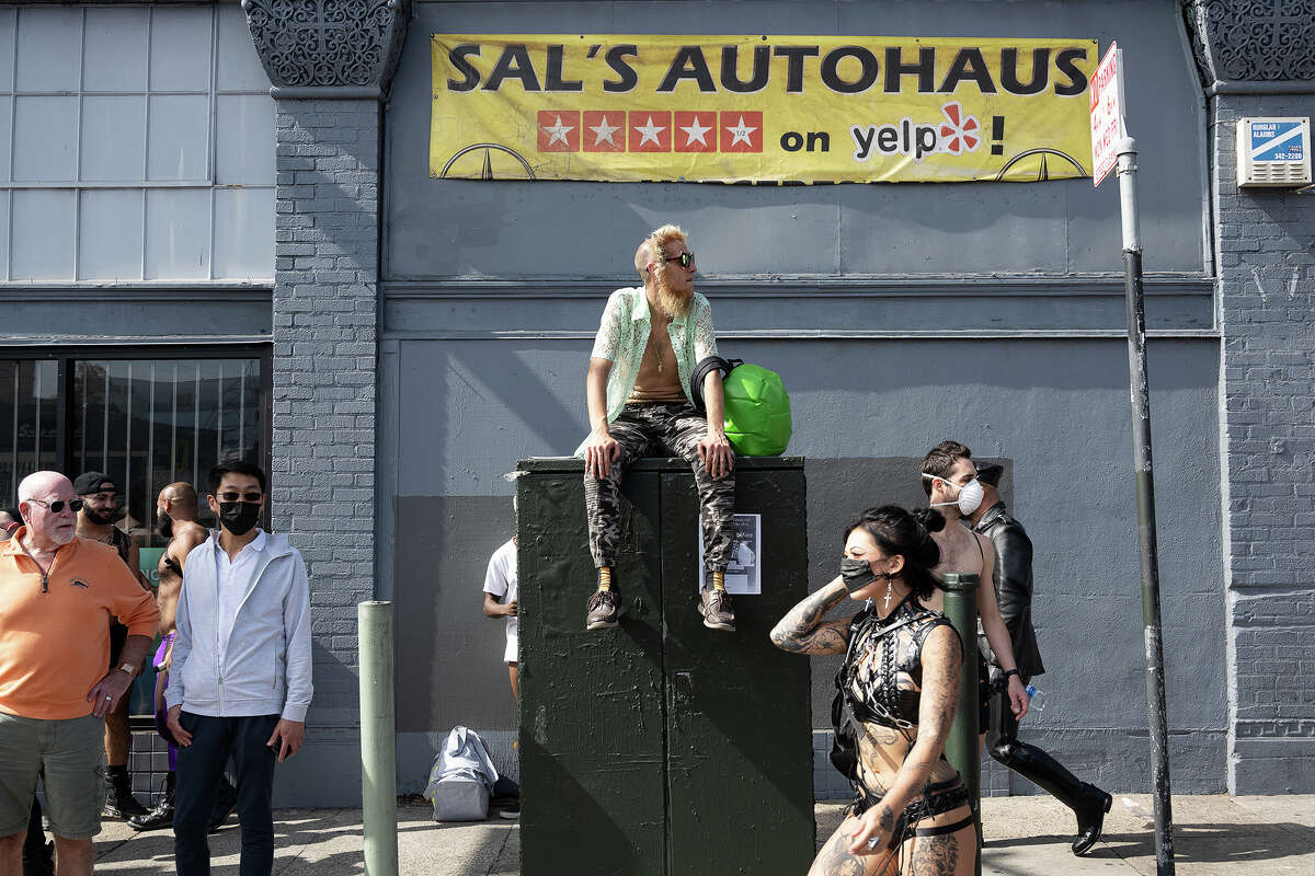 People take in the Folsom Street Fair in San Francisco, Calif. on Sept. 26, 2021.