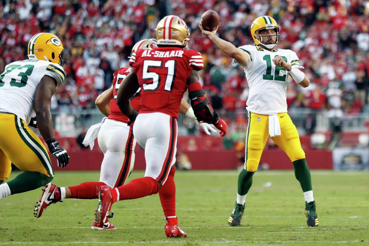 Green Bay Packers' Aaron Rodgers passes against San Francisco 49ers in 2nd quarter during NFL game at Levi's Stadium in Santa Clara, CA on Sunday, September 26, 2021.