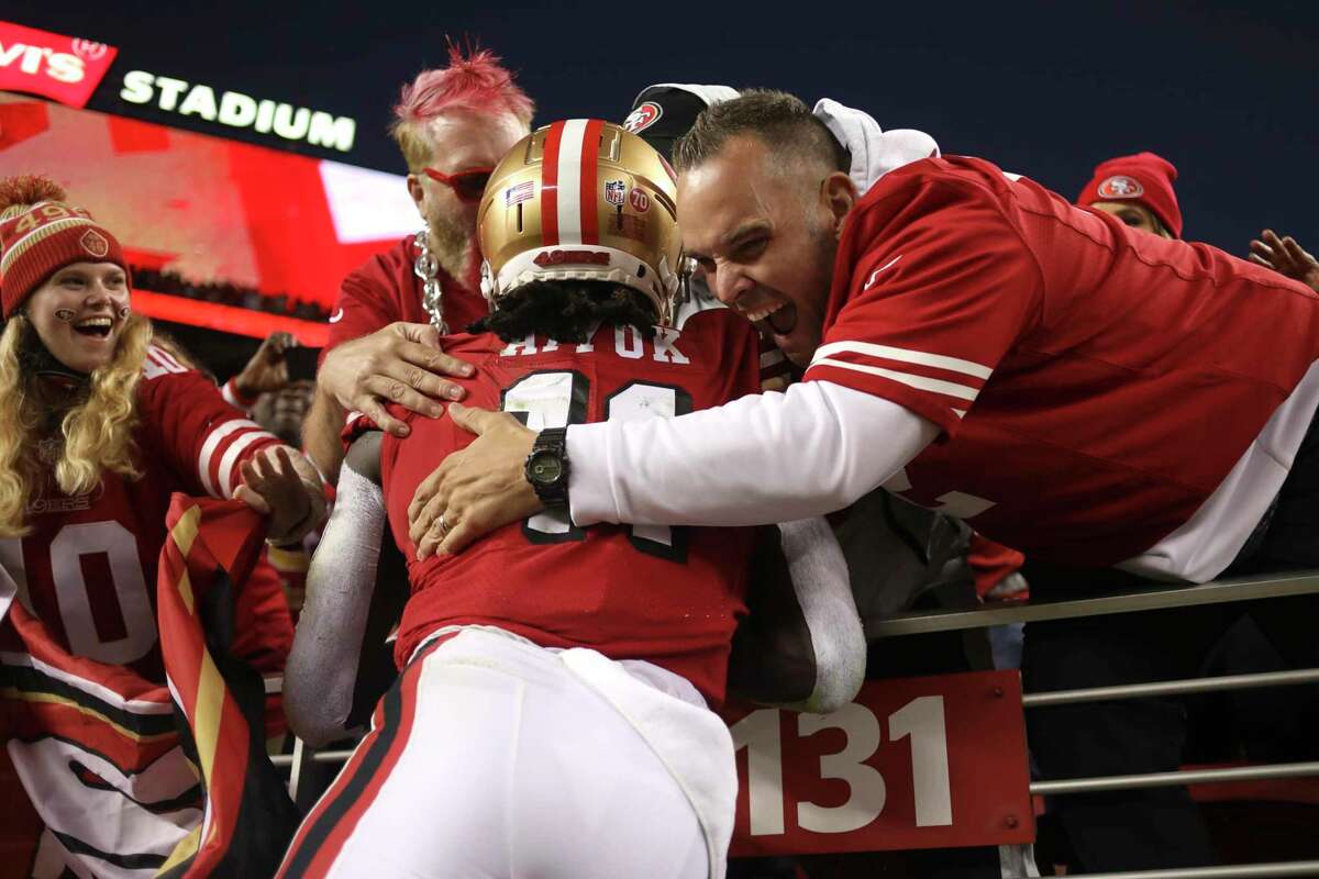 San Francisco 49ers wide receiver Brandon Aiyuk (11) celebrates with fans after scoring against the Green Bay Packers during the second half of an NFL football game in Santa Clara, Calif., Sunday, Sept. 26, 2021. (AP Photo/Jed Jacobsohn)