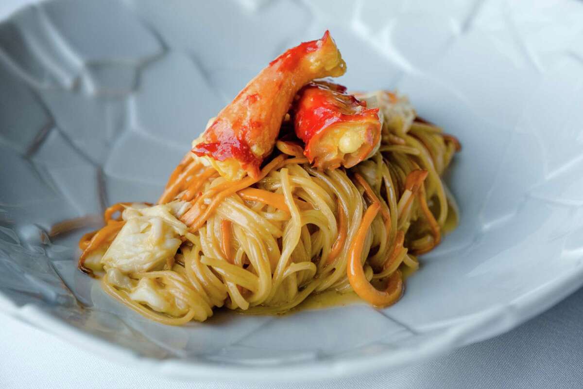 Royal boulevard crab pasta with tagliatelle and cordysep mushrooms.