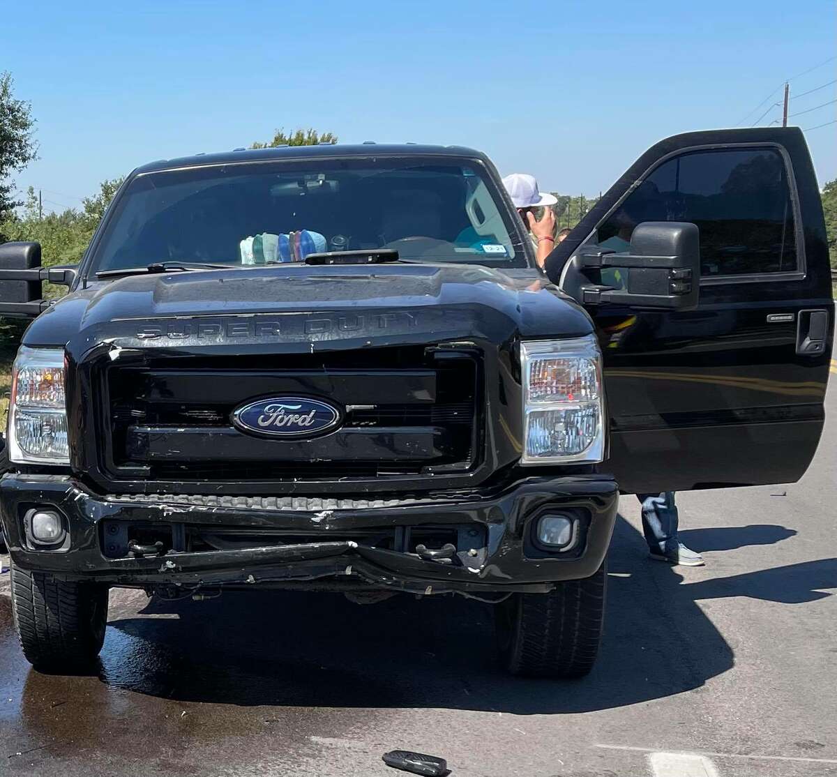 The force of the impact damaged the front end of the teenager's truck. 