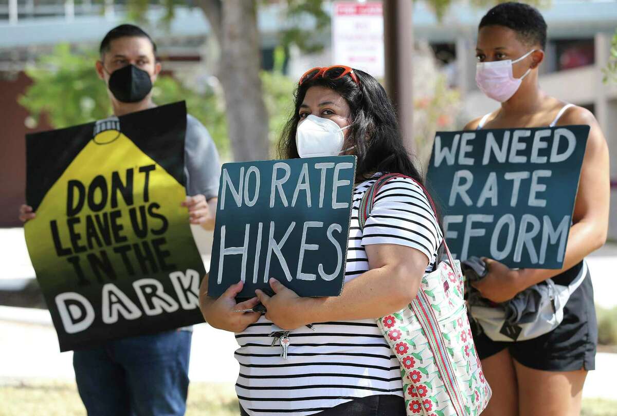 Valerie Morales (center), an organizer with Climate Collective, joins a small group of residents in September concerned with the possibility of a rate hike by CPS Energy. Residents had their chance to voice their concerns on December 14. 