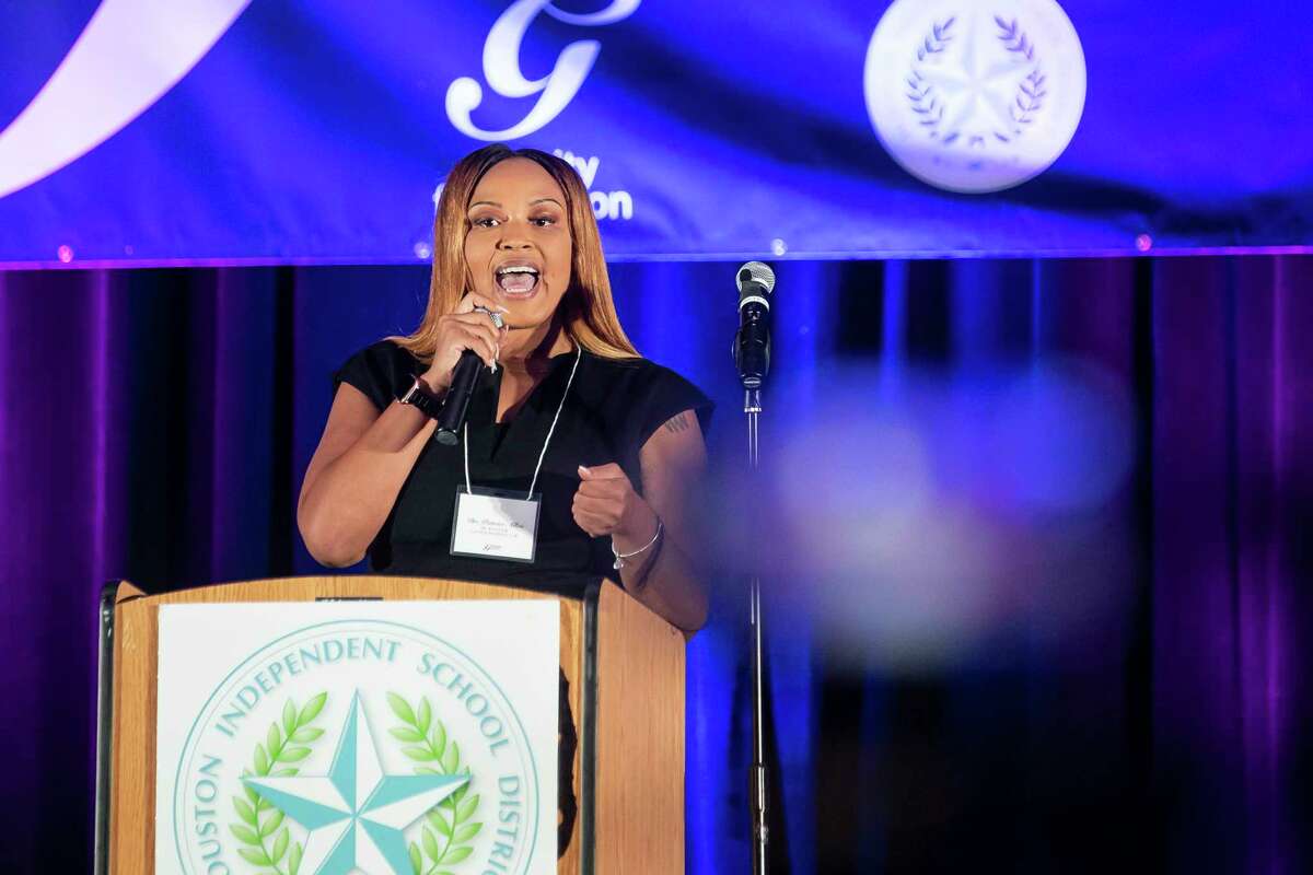 Patrice Allen, manager of the G-Unity Business Lab, speaks during the induction ceremony for the G-Unity Business Lab, Monday, Sept. 27, 2021, at Wheatley High School in Houston. The initiative is a partnership between Curtis "50 Cent" Jackson's G-Unity Foundation and Houston Independent School District. The business lab will offer MBA-style business classes for students interested in entrepreneurial endeavors.