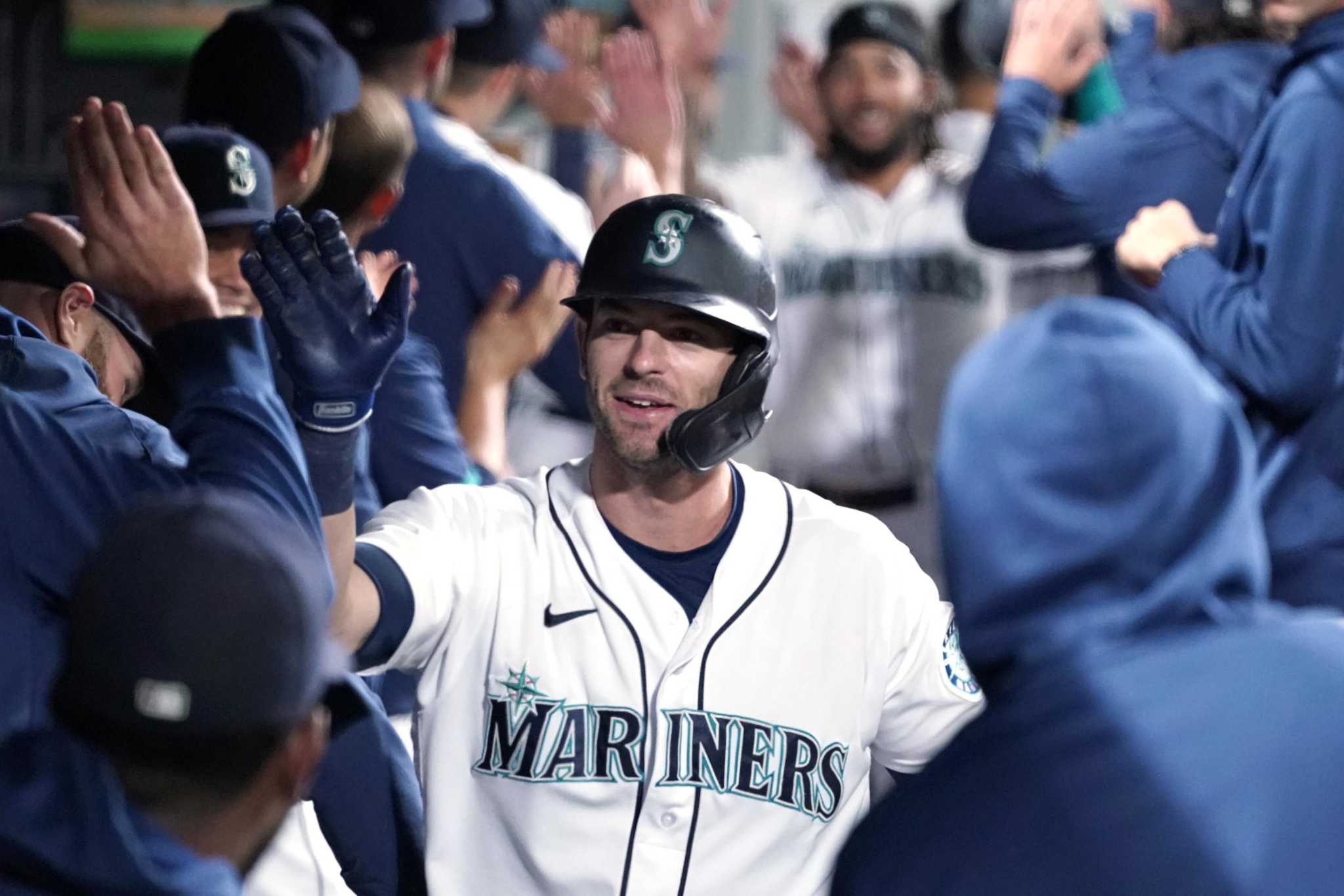 Mitch Haniger hits 2 HRs, Mariners beat A's 13-4 to gain in wild-card race