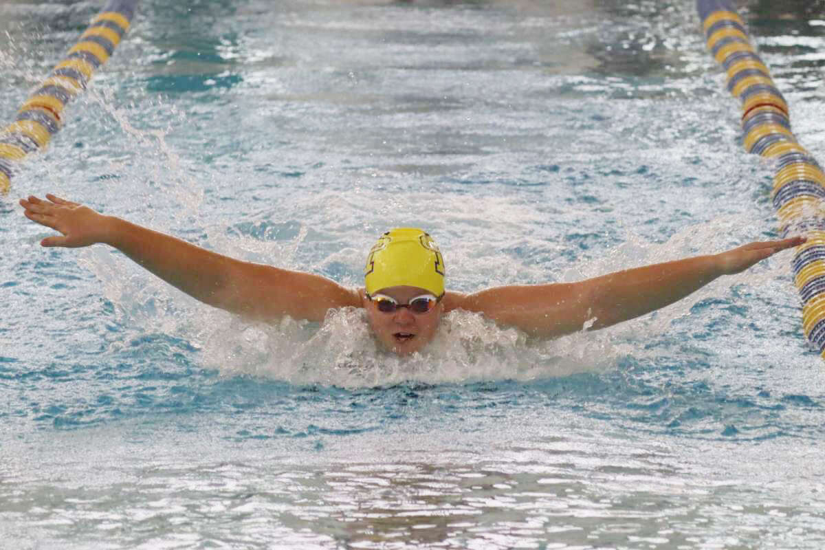Annika Arendt swims the butterfly during the 200-yard medley relay on Sept. 23.