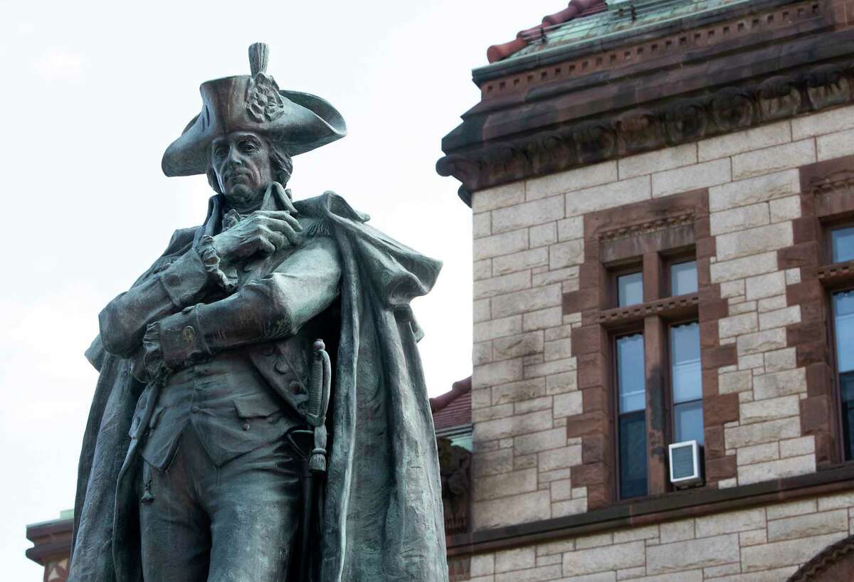 What's the story behind the iconic statues outside Progressive Field?