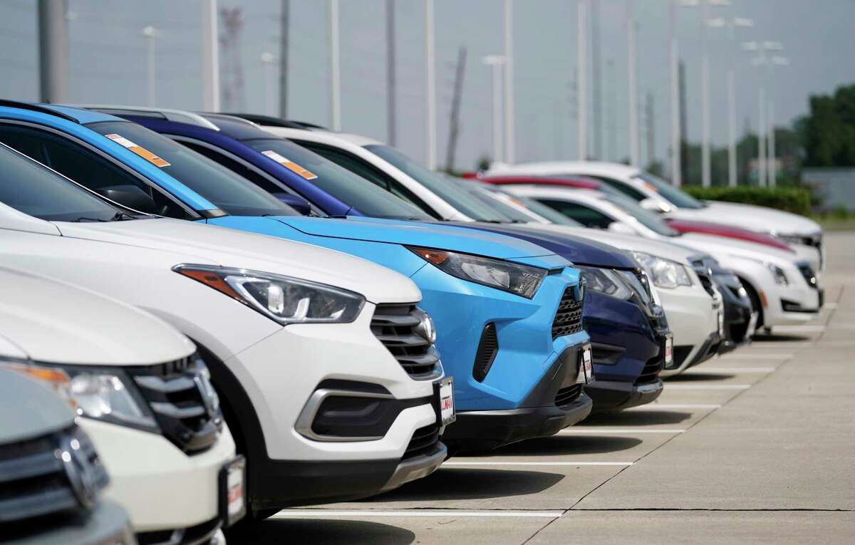 A selection of used vehicles at Team Gillman Subaru North 18202 North Fwy., are shown Friday, July 16, 2021 in Houston. Inventory of new vehicles is low.