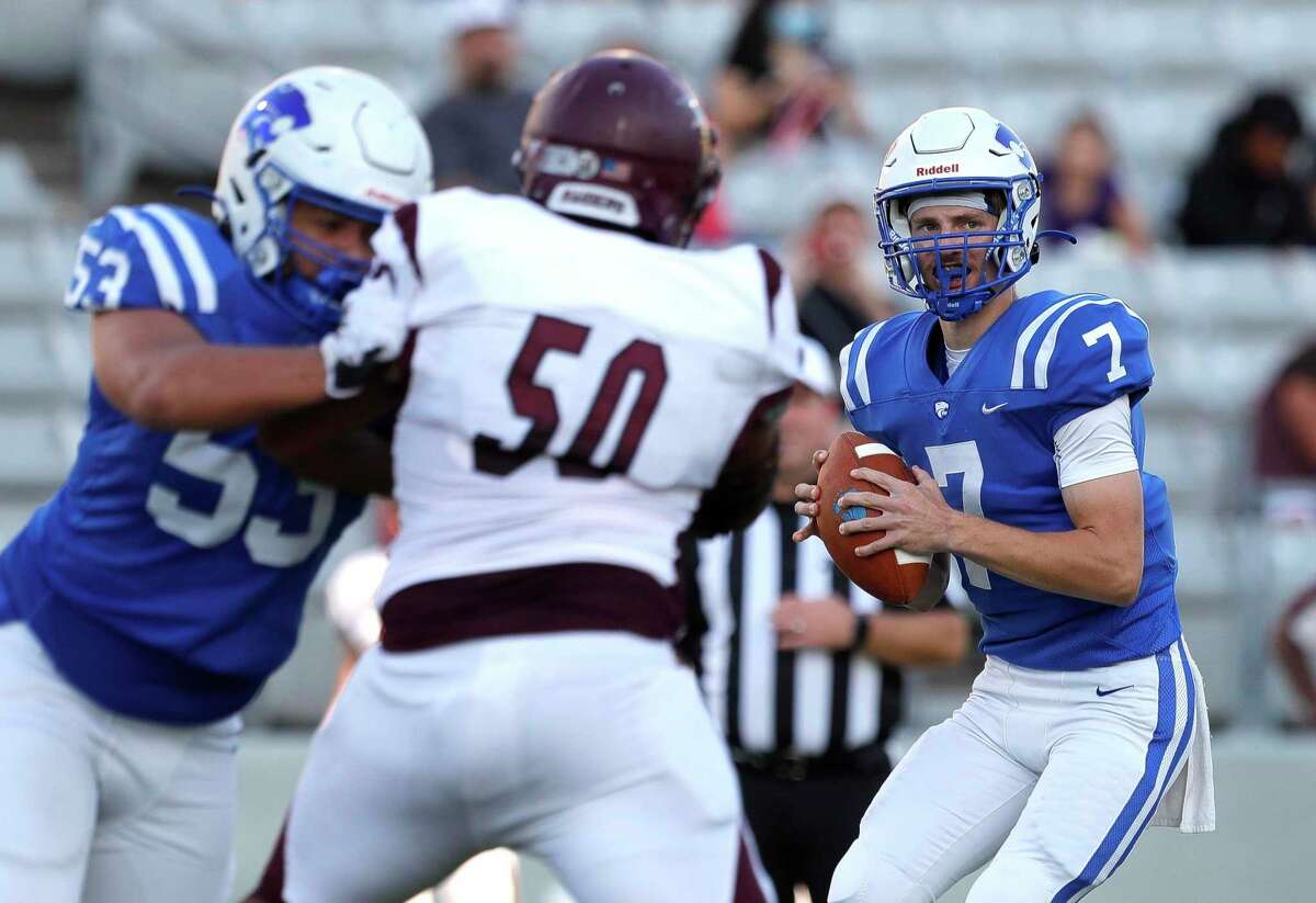 Cypress Creek quarterback Brad Jackson (7) looks to pass during the second quarter of a high school football game, Saturday, Sept. 25, 2021, in Cypress.