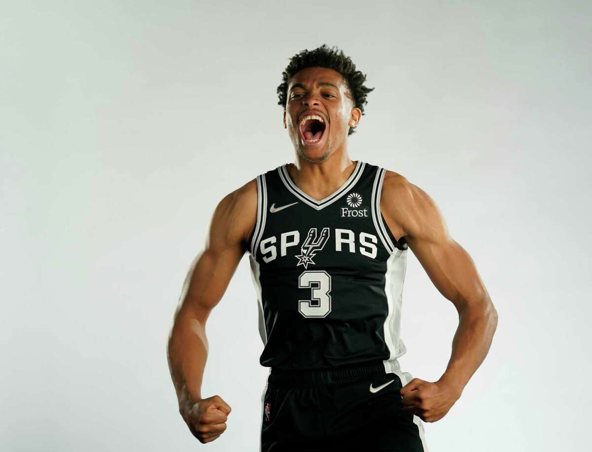 San Antonio Spurs forward Keldon Johnson poses for photos during the NBA basketball team's Media Day, Monday, Sept. 27, 2021, in San Antonio. (AP Photo/Eric Gay)