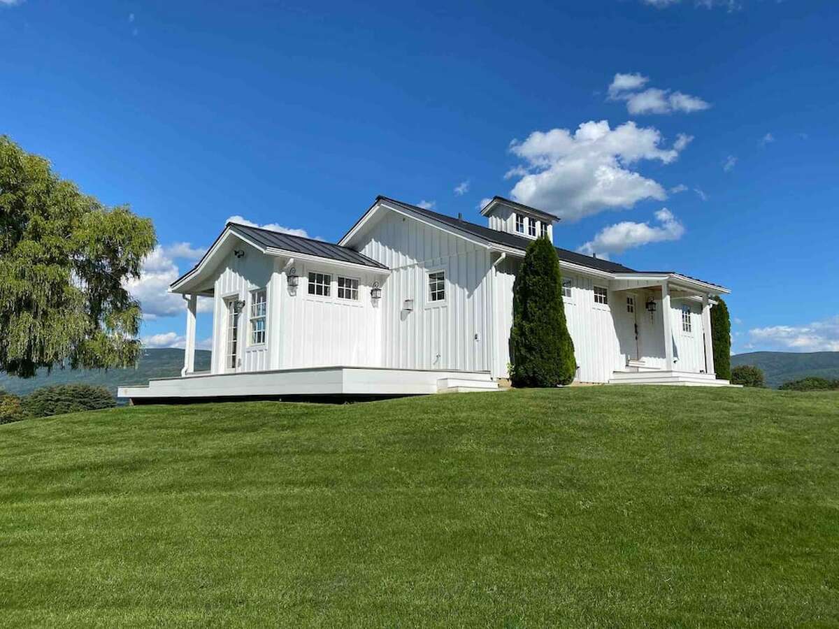 This beautiful Vermont home sits on 25 acres with spectacular views.