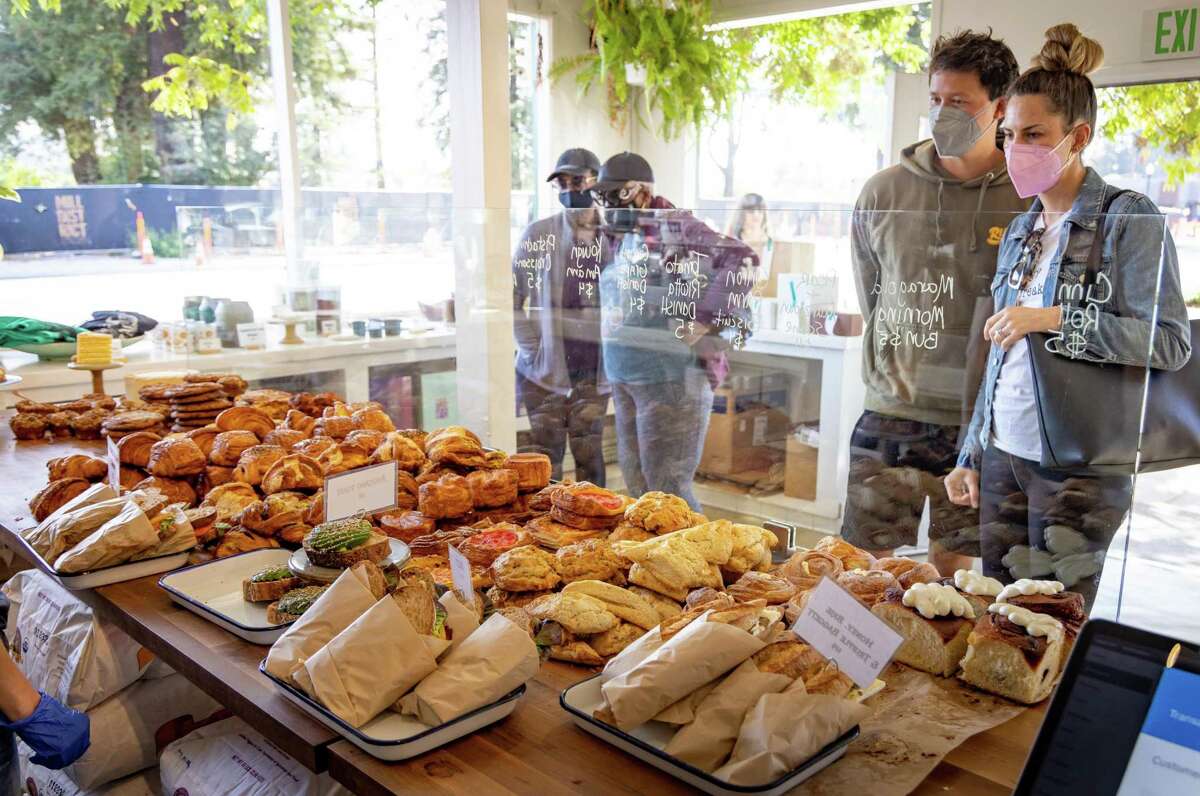 Patrons browse pastries at the Quail and Condor bakery in Healdsburg.