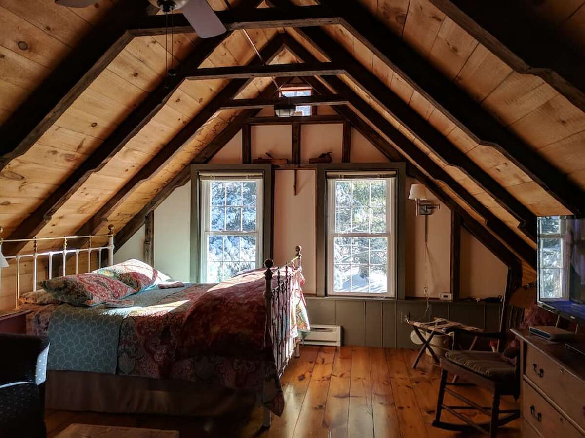 This Airbnb was built from a saved, relocated and rebuilt barn from the 1850s.