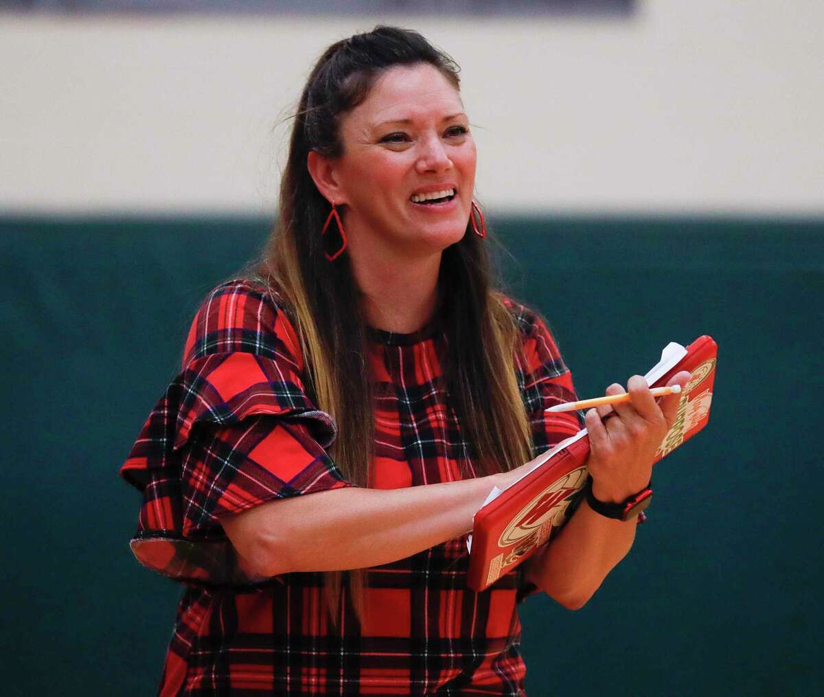 The Woodlands head coach Terri Wade is seen during the first set of a high school volleyball match at The Woodlands High School, Tuesday, Sept. 28, 2021, in The Woodlands.