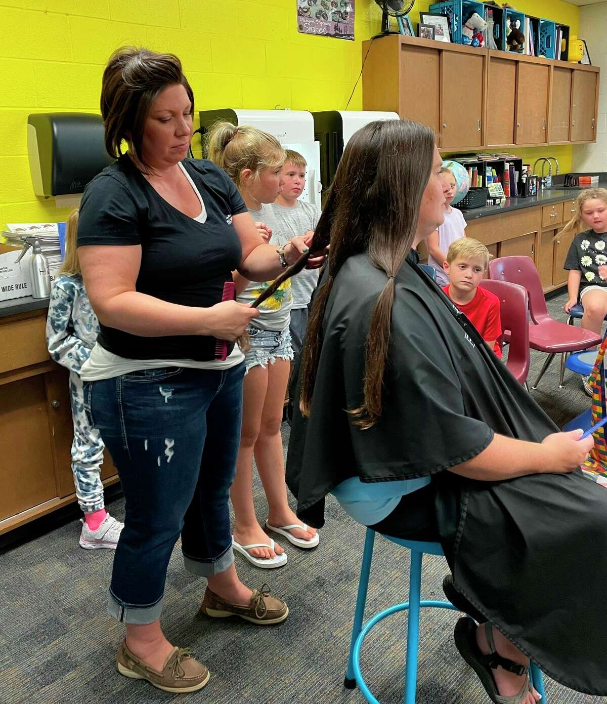 Morley Stanwood teacher donates locks to hair loss nonprofit