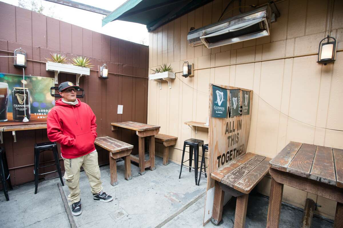 Co-owner Chris LaMotte shows off the outdoor patio area in the back of Blackthorn Tavern in San Francisco on Sept. 27, 2021.