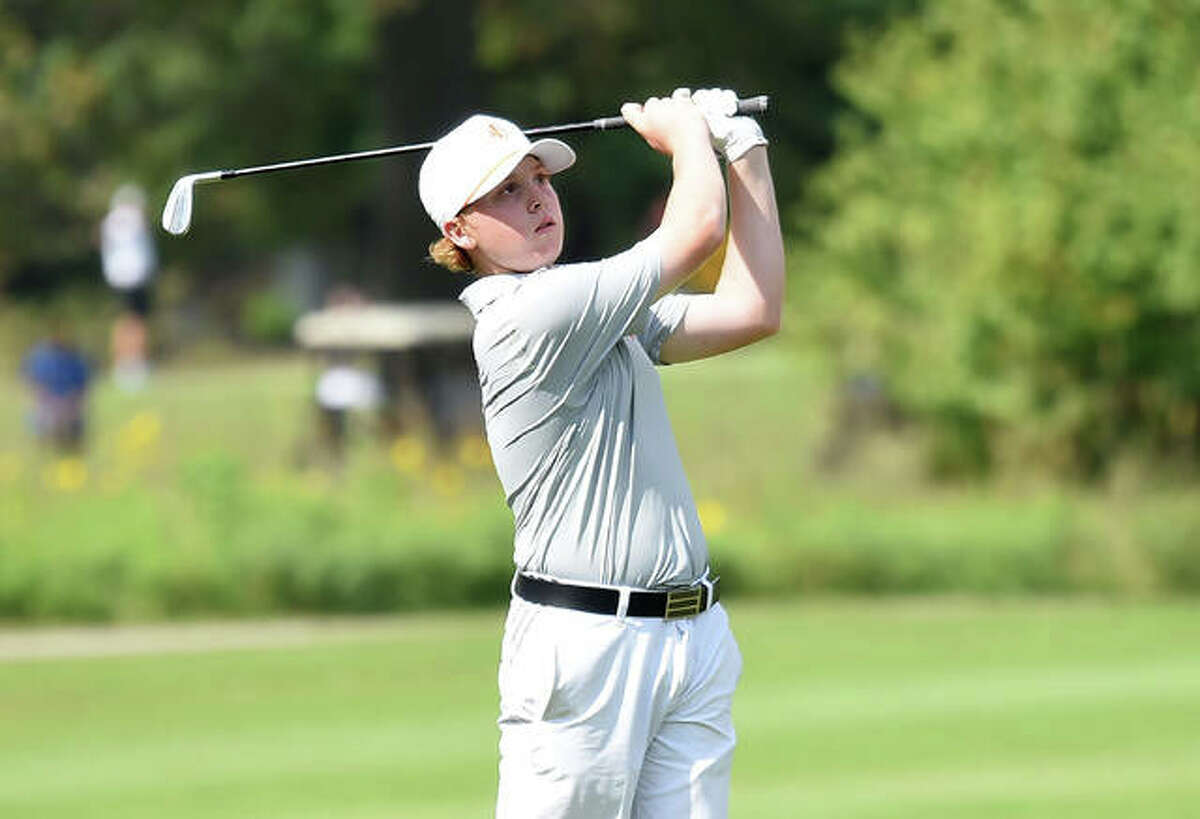 Edwardsville’s Mason Lewis watches his second shot on No. 11 at Arlington Greens Golf Course during the Class 3A Collinsville Regional in Granite City.