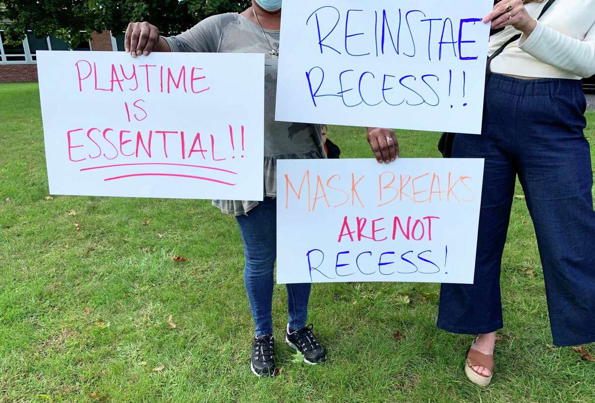 Shown are some of the signs that peaceful protesters displayed Wednesday in front of the Middletown Board of Education building.