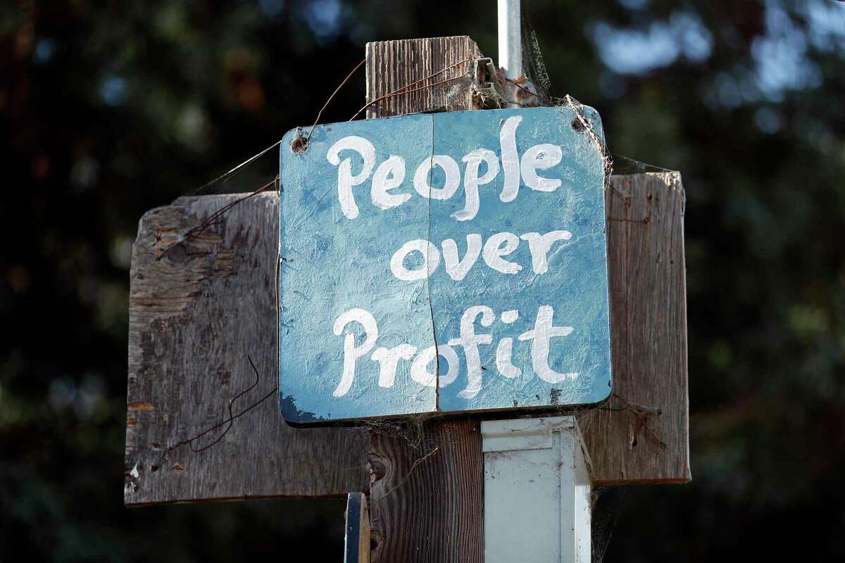 A sign at People’s Park in Berkeley advocates "People over Profit." The UC regents, who own the park, are expected to approve a housing project this week for students and the indigent people who have gathered there for generations. Opponents say the park’s legacy should be preserved.