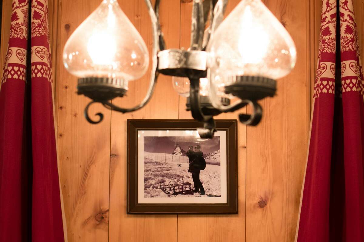 Co-owner Natalie Horwath posted family photos on the walls of the Matterhorn restaurant in San Francisco on September 28, 2021.