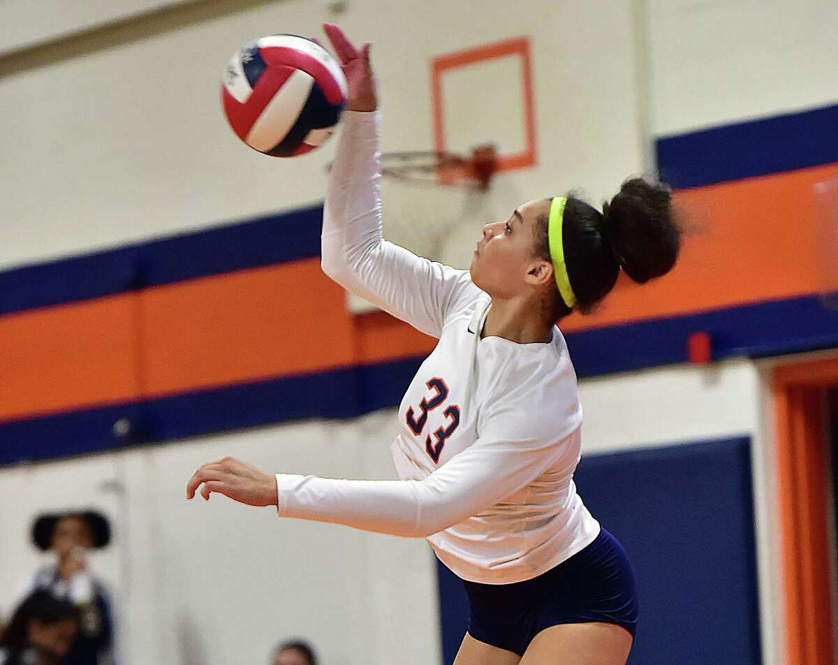 Lyman Hall outside hitter Mackenzie Grady serves against West Haven Wednesday, September 12, 2018, at Lyman Hall High School in Wallingford. West Haven won, 3-2 (25-22, 23-25, 25-26, 25-20, 15-13).