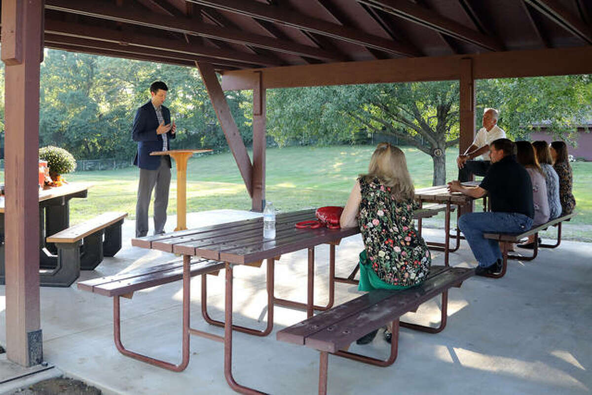 Edwardsville Township Supervisor, Kevin Hall, gave his remarks Tuesday during a dedication ceremony at pavilion #6 in Township Park. The pavilion has been dedicated to Sally Speciale, who was a frequent visitor.