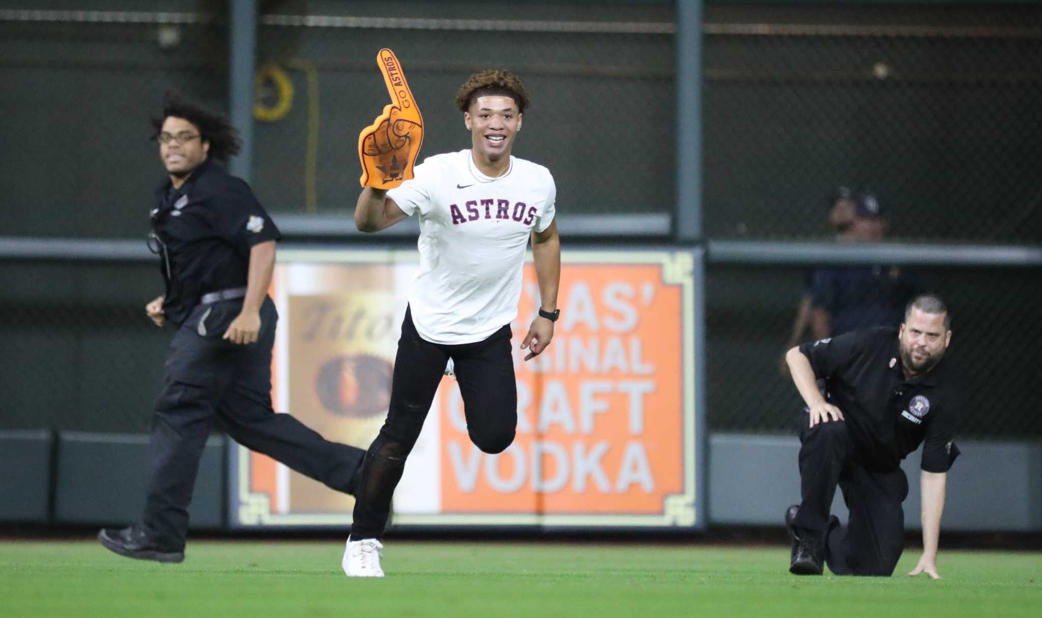 Two Astros Fans (Shirtless Cowboy Included) Run Onto the Field