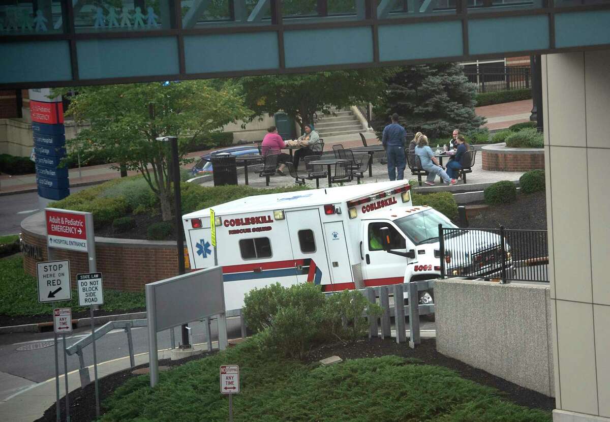 An ambulance drives up to the emergency room entrance at Albany Medical Center on Thursday, Sept. 30, 2021, in Albany, N.Y. An Albany woman is suing Upper Hudson Planned Parenthood and the Capital Region's largest hospital systems for allegedly neglecting to provide her medical care and guidance after a failed abortion – which she said resulted in weeks of pain, extreme blood loss, and eventually, a premature birth.
