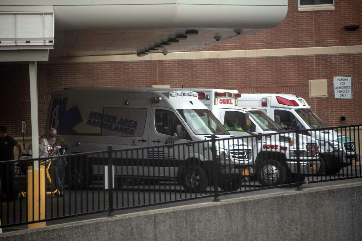 Ambulances are seen parked outside the emergency room entrance at Albany Medical Center on Thursday, Sept. 30, 2021 in Albany, N.Y.