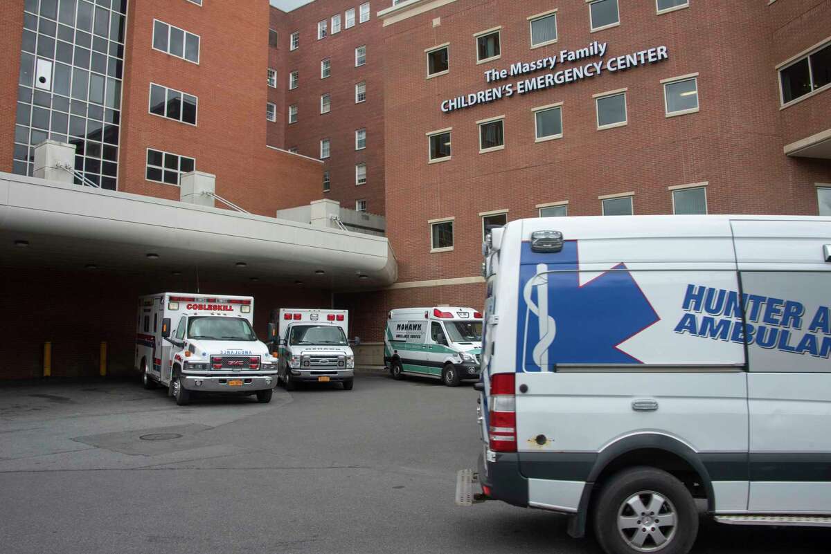 Ambulances are seen parked outside the emergency room entrance at Albany Medical Center on Thursday, Sept. 30, 2021 in Albany, N.Y. Albany Medical Center was on a list Dec. 6, 2021 to pause some elective surgeries for two weeks amid staffing shortages and the continuing pandemic.