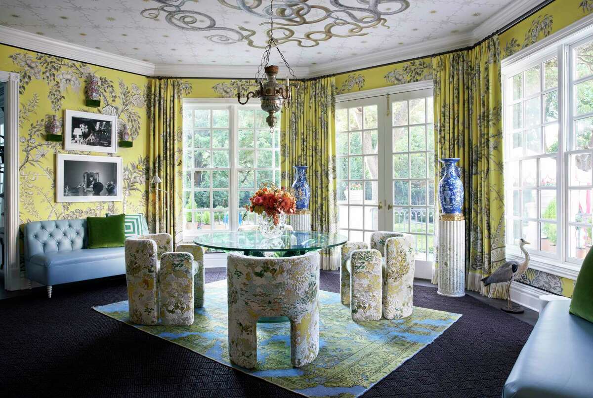 1. If show houses offer ideas and information on design trends, the top trend you’ll see here is color. Houston interior designer Dennis Brackeen’s morning room is a good example of both strong colors and a maximalist approach to design. He uses Jim Thompson Palampore wallpaper in bright yellow (citron) with a chinoiserie pattern along with matching draperies. Custom made chairs in Kravet’s Edent upholstery surround a Lalique cactus table.