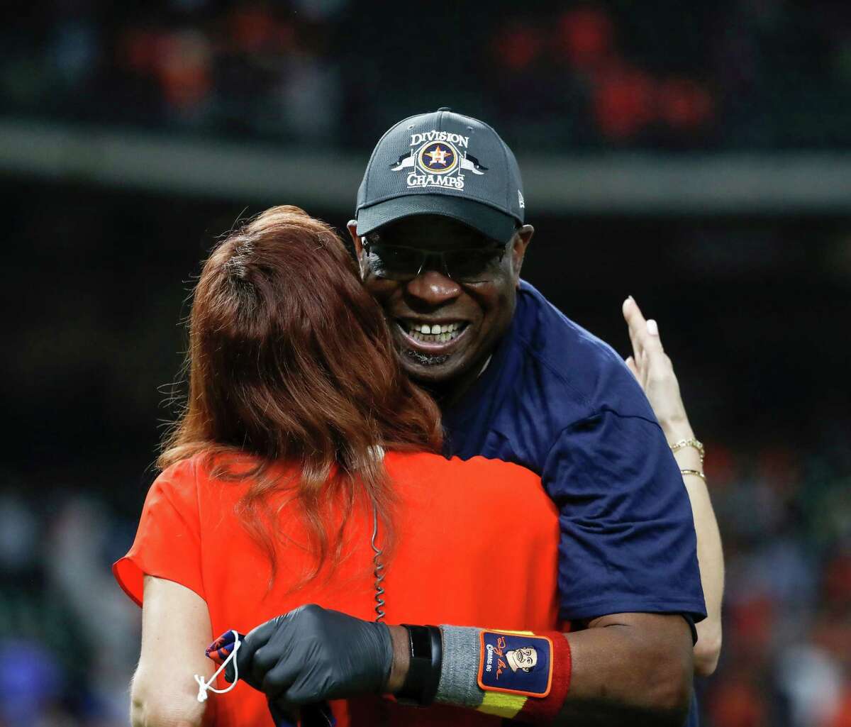 HOUSTON, TEXAS - SEPTEMBER 30: Manager Dusty Baker Jr. #12 of the Houston Astros celebrates after the game against the Tampa Bay Rays at Minute Maid Park on September 30, 2021 in Houston, Texas.