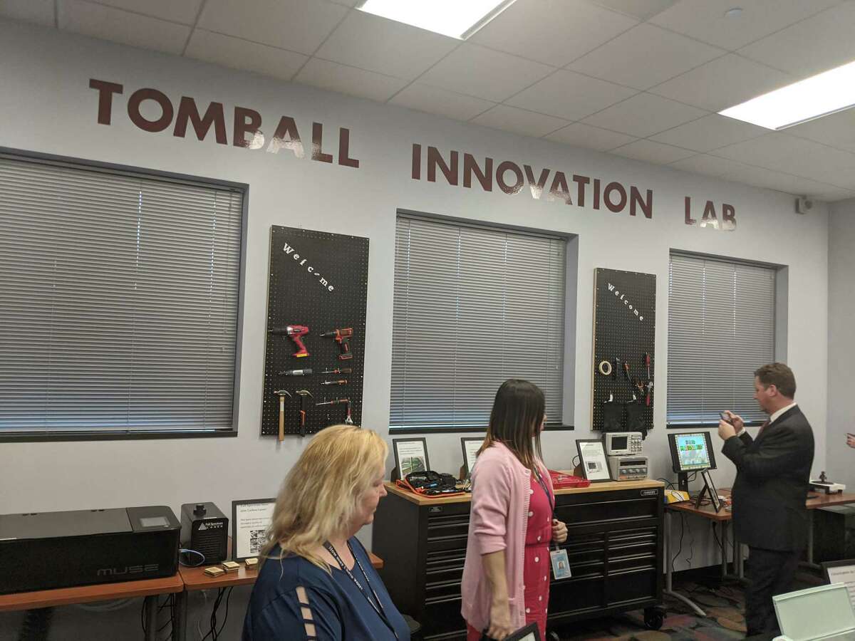 Officials, residents and students attend the grand opening of Lone Star College-Tomball Library's innovation lab. The lab offers the community new equipment and technology including virtual reality, 3D printers, soldering and laser cutting.