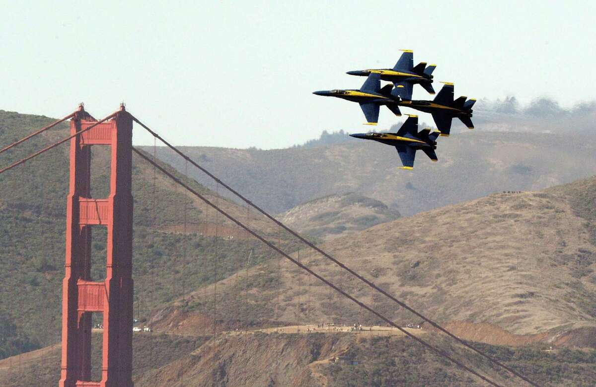 The Blue Angels fly near the Golden Gate Bridge, seen in October 2019 from the Fairmont Hotel.