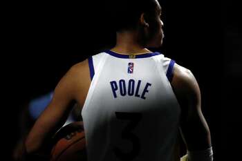 Golden State Warriors' Jordan Poole arrives to be photographed during media day at Chase Center in San Francisco, CA on Monday, September 27, 2021.