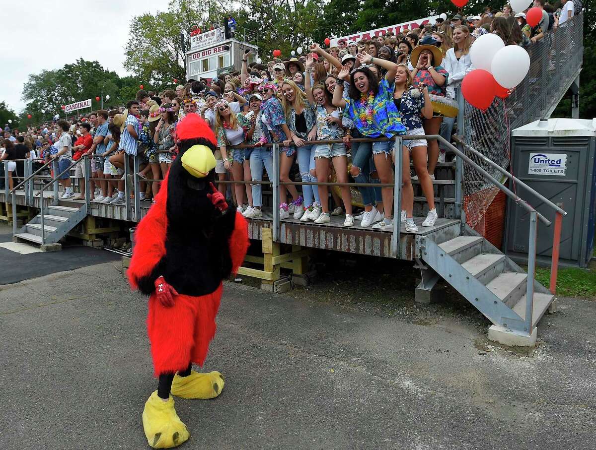 Cardinal fans cheer from the grandstands after structural repairs were completed at Cardinal Stadium for Greenwich High's football game against Danbury on Sept. 14, 2019 in Greenwich, Connecticut.