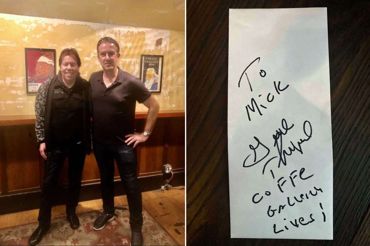 On the left, musician George Thorogood poses on stage with Maggie McGarry's co-owner Mick Graham.  Thorogood played in the bar in the past when it was called Coffee Gallery.  On the right is a signed autograph that Thorogood gave Graham after visiting the bar.